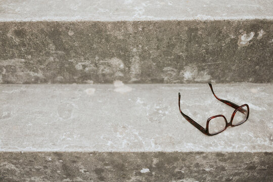 Glasses forgotten on stone steps