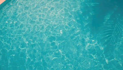 Unrecognizable worker applying blue paint to a swimming pool surface, repair work, safety measures