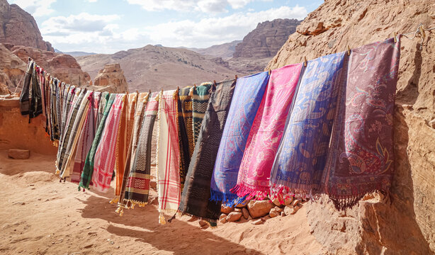 Traditional textiles displayed in Petra's spectacular desert