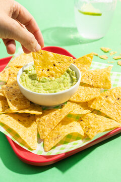 Mexican nachos with creamy guacamole dip