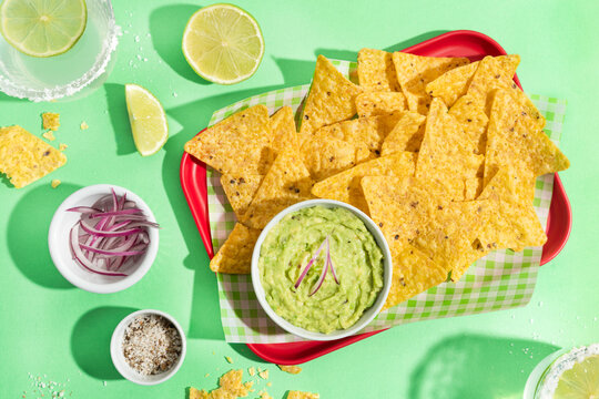Mexican nachos with creamy guacamole dip