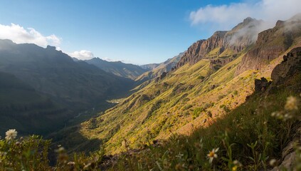 Naklejka premium Volcanic rock landscape with Mediterranean plants in the Masca Gorge, geological interest in natural scenery