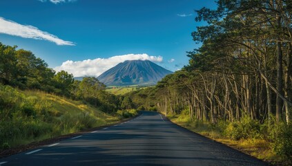 Curving highway through mountainous terrain, suitable for editorial header backgrounds