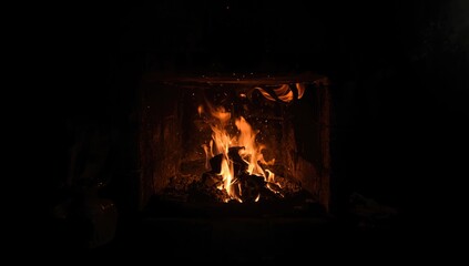 Indoor charcoal stove with extinguished fire, highlighting ventilation and safety checks, World Fire Safety Day