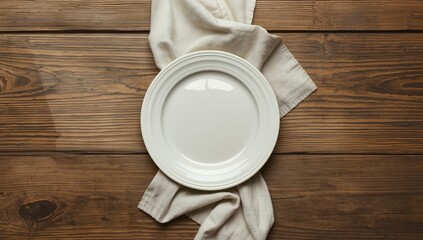 Unoccupied dish and cloth on rustic wooden surface, suitable for food styling or table setting backgrounds
