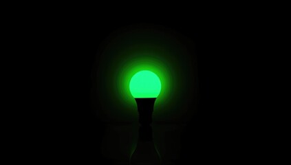 Green LED light source against black backdrop intended for informational graphics, energy conservation, Earth Day