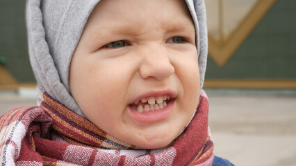 Close-up of a little angry boy's face