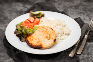 chicken burger with rice and salad