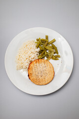 chicken burger with rice and salad