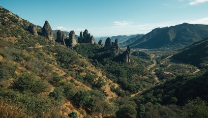 Valley of the Monjes scenic view with lush trees, rocky earth, and mountain backdrop, highlighting geological features and park setting