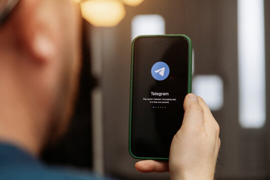 iPhone display with Telegram messaging and audio calling app