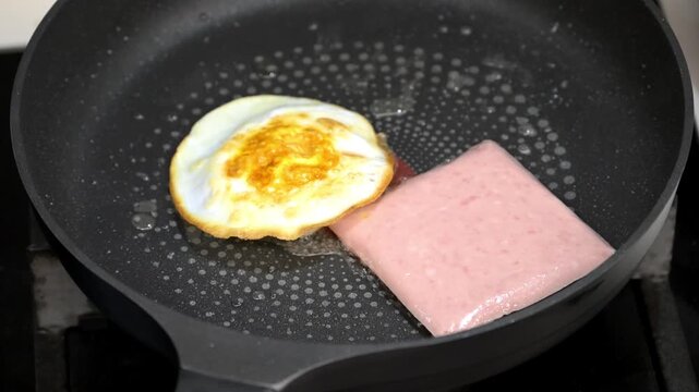Searing Eggs and Ham in a Frying Pan