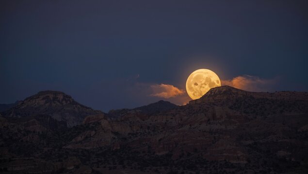 Desert mountains under a supermoon in Barstow, focused on natural celestial events, PNG file