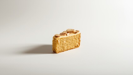 Banana cake with almond topping, highlighting nut inclusion for flavor enhancement, food preparation and presentation focus