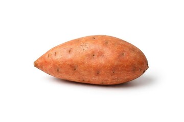 Raw sweet potato positioned on neutral white photography background