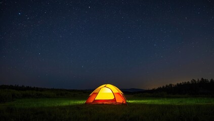 Tent pitched outdoors beneath a clear star-filled sky, suitable for nighttime campsite setup