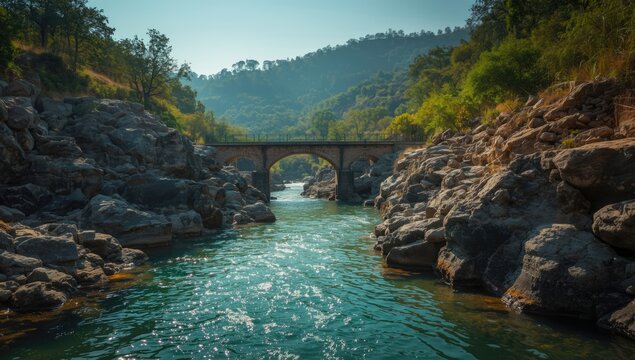 Stream flow through Barda Hills, Gujarat, India, highlighting erosion patterns in a rugged terrain