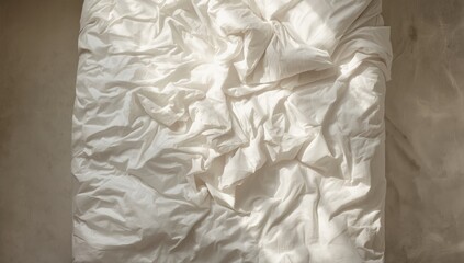 White sheets with creases and gentle blur, ideal for editorial headers or textile textures, World Sleep Day