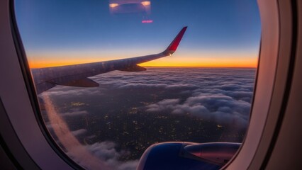 Airplane Wing View from Window at Sunset.