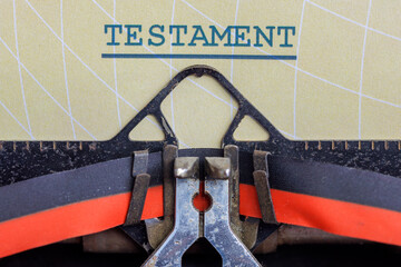 Document with the Dutch text &lsquo;Will&rsquo; - concept for last will and testament in an old typewriter