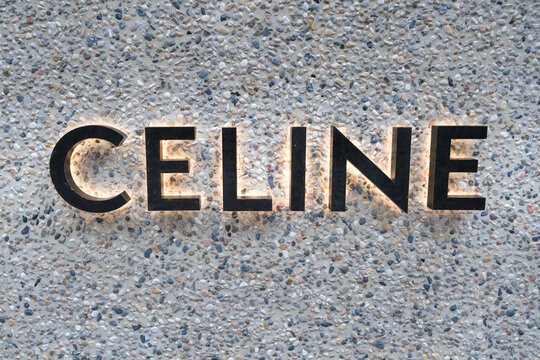 C&eacute;line signage on a textured wall in Ginza, Tokyo, showcasing modern retail design