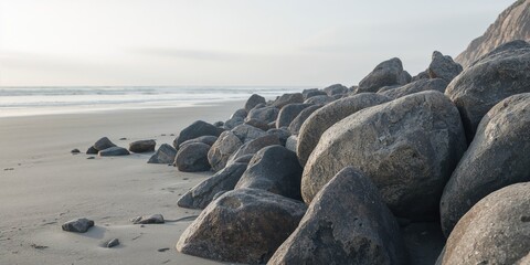Eroded rocks scattered along a rugged beach in a geopark, highlighting geological activity
