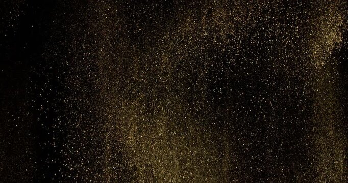 Super Slow Motion of Flying Dirt Soil in the Air. Filmed on High Speed Cinema Camera , 1000fps. Isolated on Black Background.