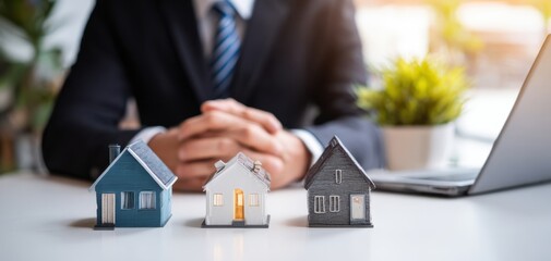 The house models representing real estate investment, mortgage planning, and property selection decisions