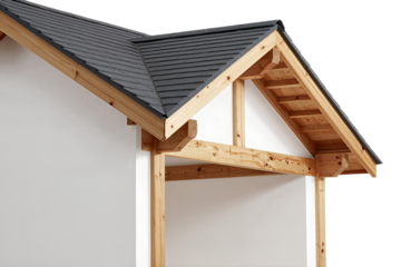 Wooden frame structure with dark shingle roof.