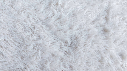 Full Frame Background of White Long Hair Faux Fur Rug Texture for Cosy Interior Design © MohamadFaizal