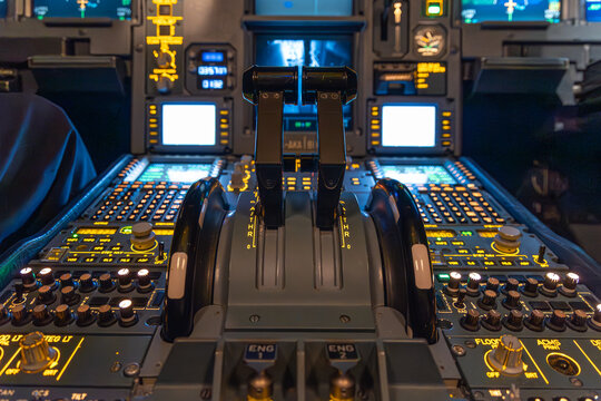 Aircraft throttle quadrant and cockpit controls
