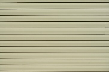 tan siding exterior house wall surface texture