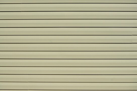 tan siding exterior house wall surface texture