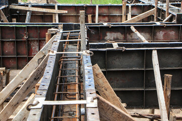Reinforced Concrete Foundation Formwork with Steel Rebar Grid at Active Construction Site