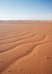 Vast, empty landscape where the flat horizon line dominates the composition, creating a powerful sense of space and openness under a clear sky, freedom, copy space, open