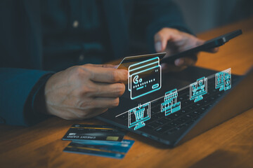 Customer using credit card and smartphone for online shopping and secure digital payments. E-commerce transaction, internet banking, and retail business concept.