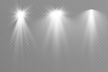 Light spotlight beams set with soft glow on transparent background.
