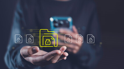 Holding smartphone with glowing secure folder and file icons, illustrating encrypted document transfer, mobile cybersecurity, confidential file protection, and data privacy in digital communication.
