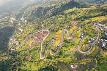 Aerial view of the famous winding S-curve road at Phu Thap Boek mountain, Phetchabun, Thailand.