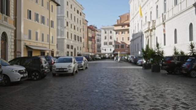 Blurred rome street with soft bokeh on cobblestone pavement and defocused historic facades street; background backplate template copyspace.