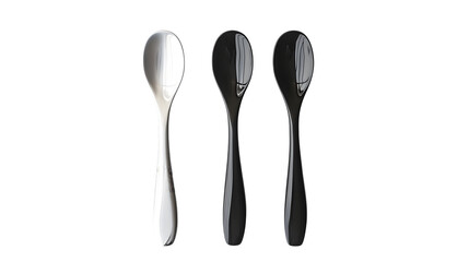 Three shiny spoons in silver and black isolated on white background