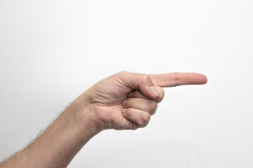 Męska dłoń ze wskazującym palcem. Zdjęcie na białym tle. © hunter76