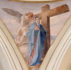 Fototapeta premium SALERNO, ITALY - OCTOBER 6, 2025:The symbolic fresco of Virgin Mary with the Cross in the church Chiesa della Santissima Annunziata by Lorenzo Iovino (1957).