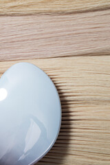 Close-up of a light blue hairbrush on blonde hair, creating a smooth, sleek look