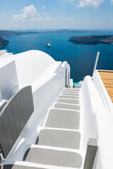 White architecture in Santorini island, Greece. Stairs to the sea. Beautiful seascape at sunny day.
