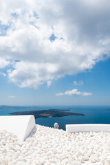 White architecture in Santorini island, Greece. Blue sky with white clouds at sunny day