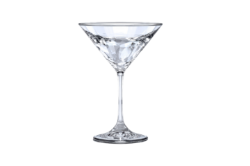 A clear martini glass is sitting on a white background. The glass is almost empty, with only a small amount of liquid left in it. Concept of relaxation and leisure, png