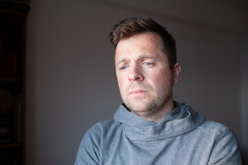 Pensive mature male person making a difficult decision or strategy, vision concept.