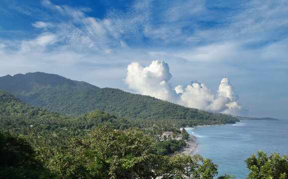 Beautiful view with a dramatic sky over the expansive beach in Senggigi, West Lombok, West Nusa Tenggara (NTB), Indonesia.