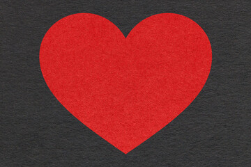 Red heart on black paper texture background with copy space for Valentines Day banner, template or greeting card